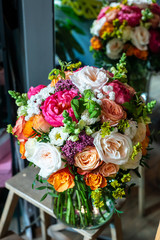 the most beautiful flowers, magnificent bouquets of flowers on the leg in the interior of the restaurant for a festive floristry store or wedding salon for the bride or groom, a bridal bouquet, butane
