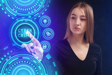 The concept of business, technology, the Internet and the network. A young entrepreneur working on a virtual screen of the future and sees the inscription: Cyber crime