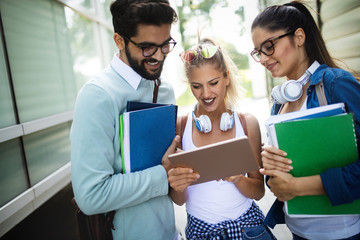 Group of friends studying together at university campus