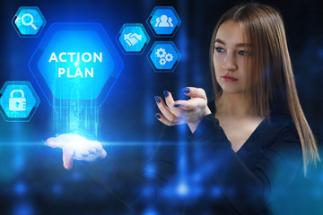 The concept of business, technology, the Internet and the network. A young entrepreneur working on a virtual screen of the future and sees the inscription: Action plan