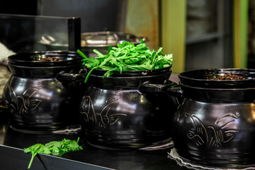 green grass in a black pot