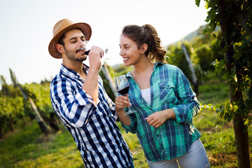 Fototapeta premium Portrait of happy people spending time in vineyard