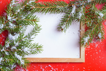 Frame to Your text on red background with christmas tree