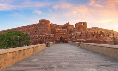 Agra Fort red sandstone medieval fort in panoramic view at sunrise. Agra Fort is a UNESCO World...