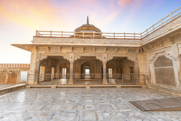 Obraz premium Agra Fort white marble royal palace known as the Musamman Burj at sunrise. Agra Fort is a medieval fort known as a classic mughal Indian architecture masterpiece. 
