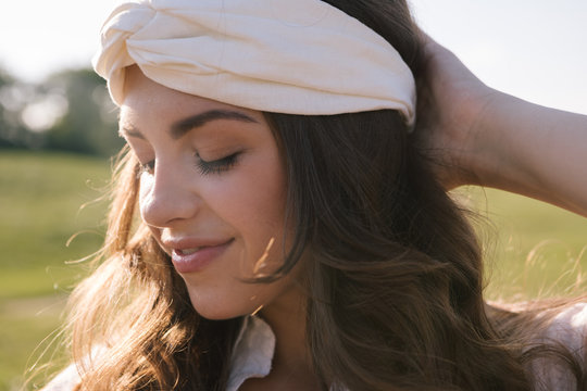 Beautiful Young Woman With Stylish Hair Accessory White Turban. Nature Style