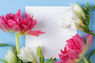 Spring flower mockup. Floral composition with copy space. Flat lay style