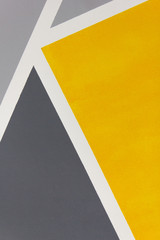 Closeup yellow and grey abstract textured  geometry background . - Vertical image