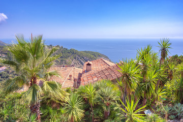 view on the Mediterranean Sea over the roofs of the picturesque medieval village of Eze