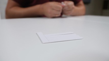 Hands of a man who manicures at home. The concept of male beauty. Manicure on men's hands. Nail file in male hands