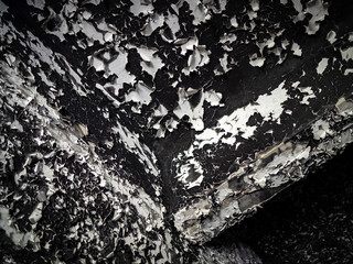 Old burnt plaster ceiling texture inside of an abandoned military building in Chernobyl-2 city in Chernobyl Exclusion Zone, Ukraine