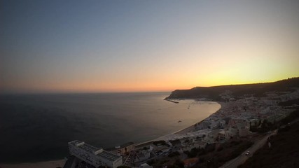 Time lapse from the sunset in Sesimbra beach. Sesimbra, Portugal