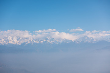 Himalaya mountains on clouds