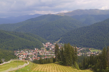 View with the city of Busteni and Baiului Mountains or Garbova Mountains - Prahova, Romania