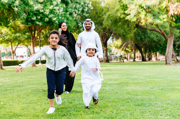 Arabian family spending time in a park