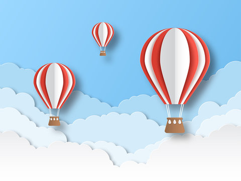 Air balloon paper cut. Colourful flying balloons in blue sky with white clouds. Airship travel 3d origami cartoon vector background
