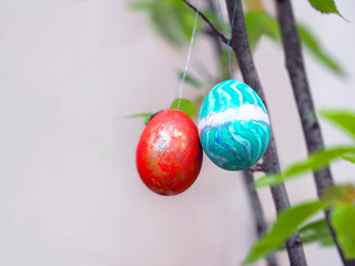 Colorful Easter eggs on a tree, easter background