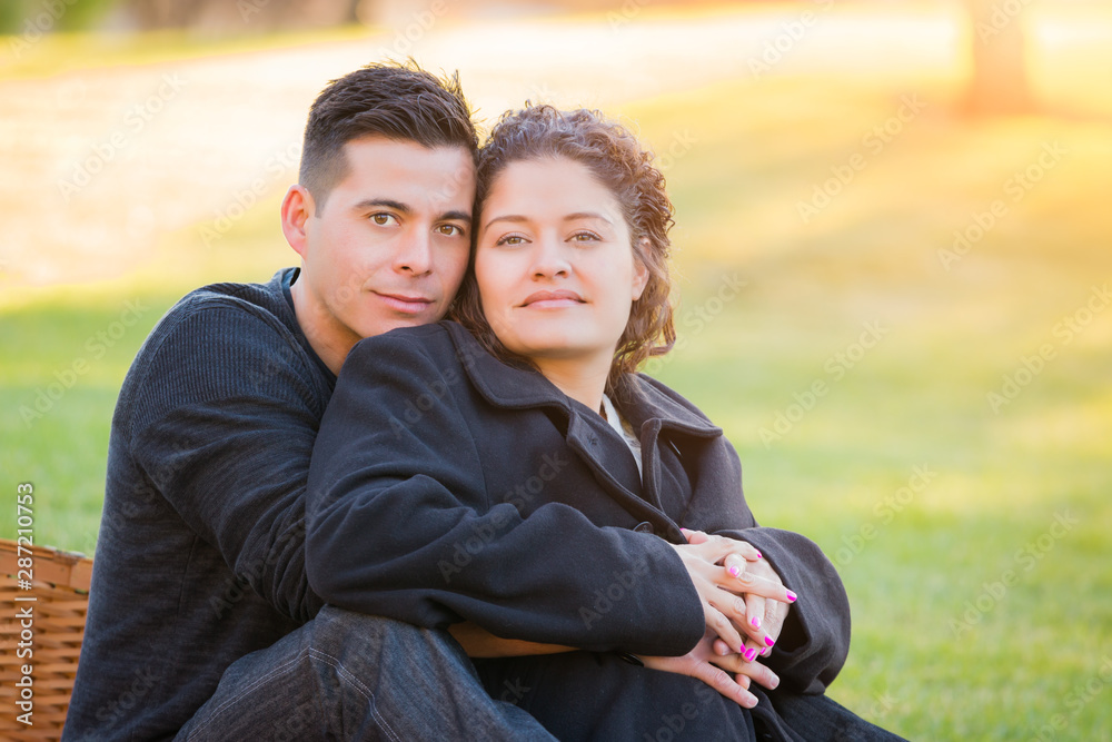 Wall mural Hispanic Pregnant Young Couple Portrait Outdoors