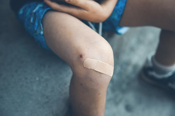 boys injured leg bandage