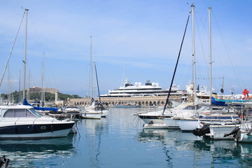 Fototapeta na wymiar Sail boats and yachting in the Marina of Antibes, Port Vauban, one of the biggest marina in Europe located in the west of the city of nice, French Riviera, France