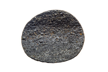 Black potato chips isolated on white