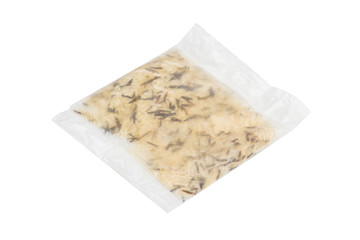 Fototapeta na wymiar Rice in a bag isolated on white