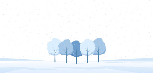 Winter landscape with frozen trees on snowy field.