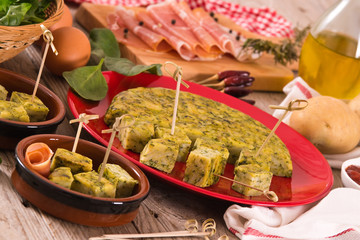      Spanish omelette with spinach. 