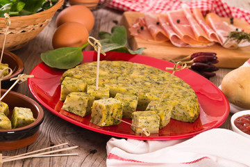      Spanish omelette with spinach. 