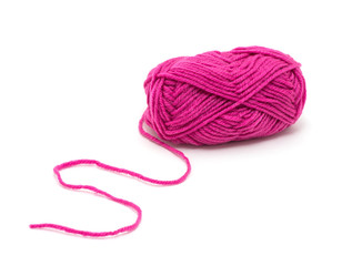 Pink knitting yarn isolated on white