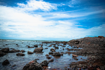 Fototapeta na wymiar sea and rocks and sky blue