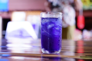 glass of water on wooden table