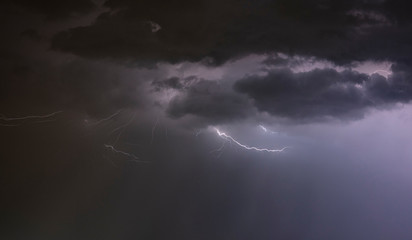 lightning over the night sky 