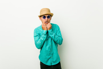 Young hispanic man wearing a summer clothes whining and crying disconsolately.
