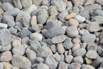 Hintergrundbild kleine graue Granitsteine an einem Strand in Bornholm, Dänemark