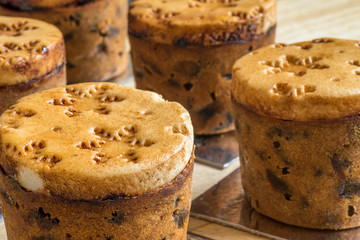 closeup view christmas mini cakes on wooden board