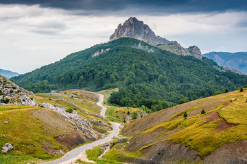 Fototapeta premium High peak Puzim with tar road in Bosnia and Herzegovina