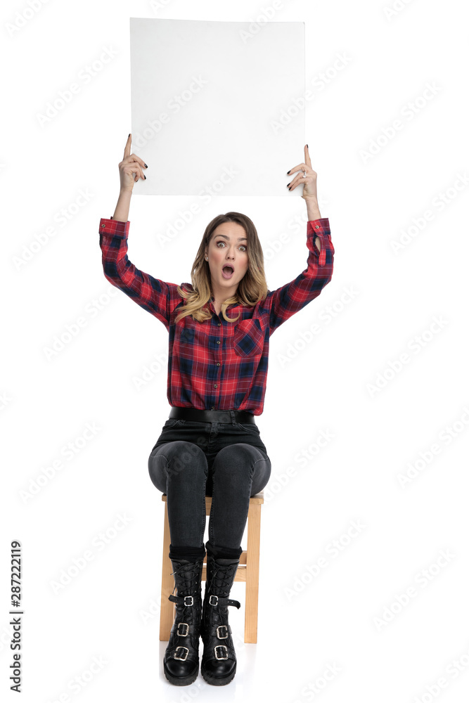 Sticker casual woman sitting with billboard overhead shocked