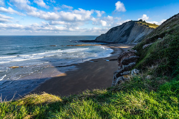Scenic landscape of Itzurun beach in Zumaia, Basque Country, Spain