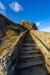 Fototapeta na wymiar Stone stairway to San Juan de Gaztelugatxe, a famous location for television series, Bermeo, Basque Country, Spain