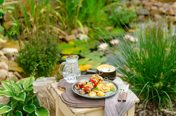 Outside grilling shish kebab