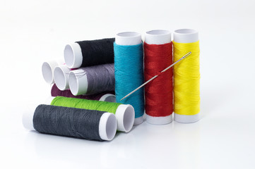 Spool of thread isolated on white background