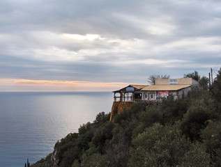 Fototapeta na wymiar House on the coast of Corfu, Greece