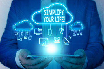 Word writing text Simplify Your Life. Business photo showcasing focused on important and let someone else worry about less ones Male human wear formal work suit presenting presentation using smart
