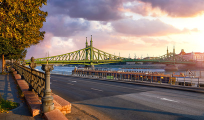 Road at Freedom bridge on Danube river in Budapest city, Hungary.
