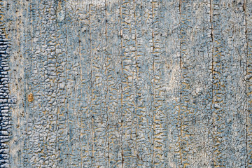 Old peeling paint on a wooden surface. retro wall background.