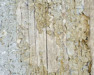 Old peeling paint on a wooden surface. retro wall background.