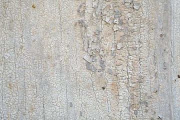 Old peeling paint on a wooden surface. retro wall background.