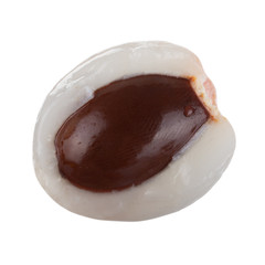 half of lychee with peel isolated on white background