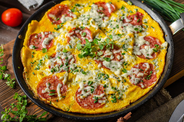 Omelette with salami and blue cheese